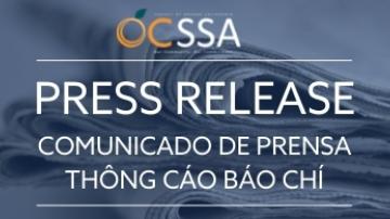 A pile of newspapers in the background with the OC Social Services Agency logo and the words Press Release in English, Spanish and Vietnamese 