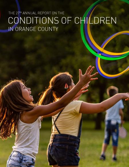 The cover of the 27th Annual Conditions of Children Report features two girls playing with brightly colored plastic hoops in a park.  