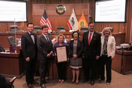 The Orange County Board of Supervisors hold a document proclaiming November Adoption Awareness Month in Orange County